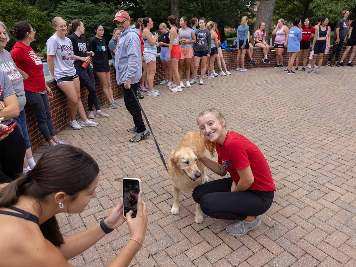 Student poses for a photo at M.O.V.E. Boot Camp